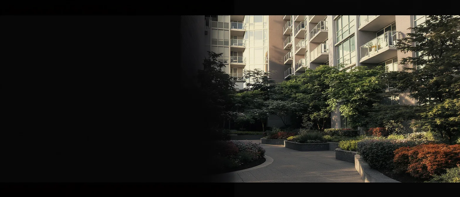 A landscaped BC strata courtyard in warm evening light